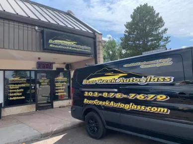 Bear Creek Autoglass storefront and branded service van